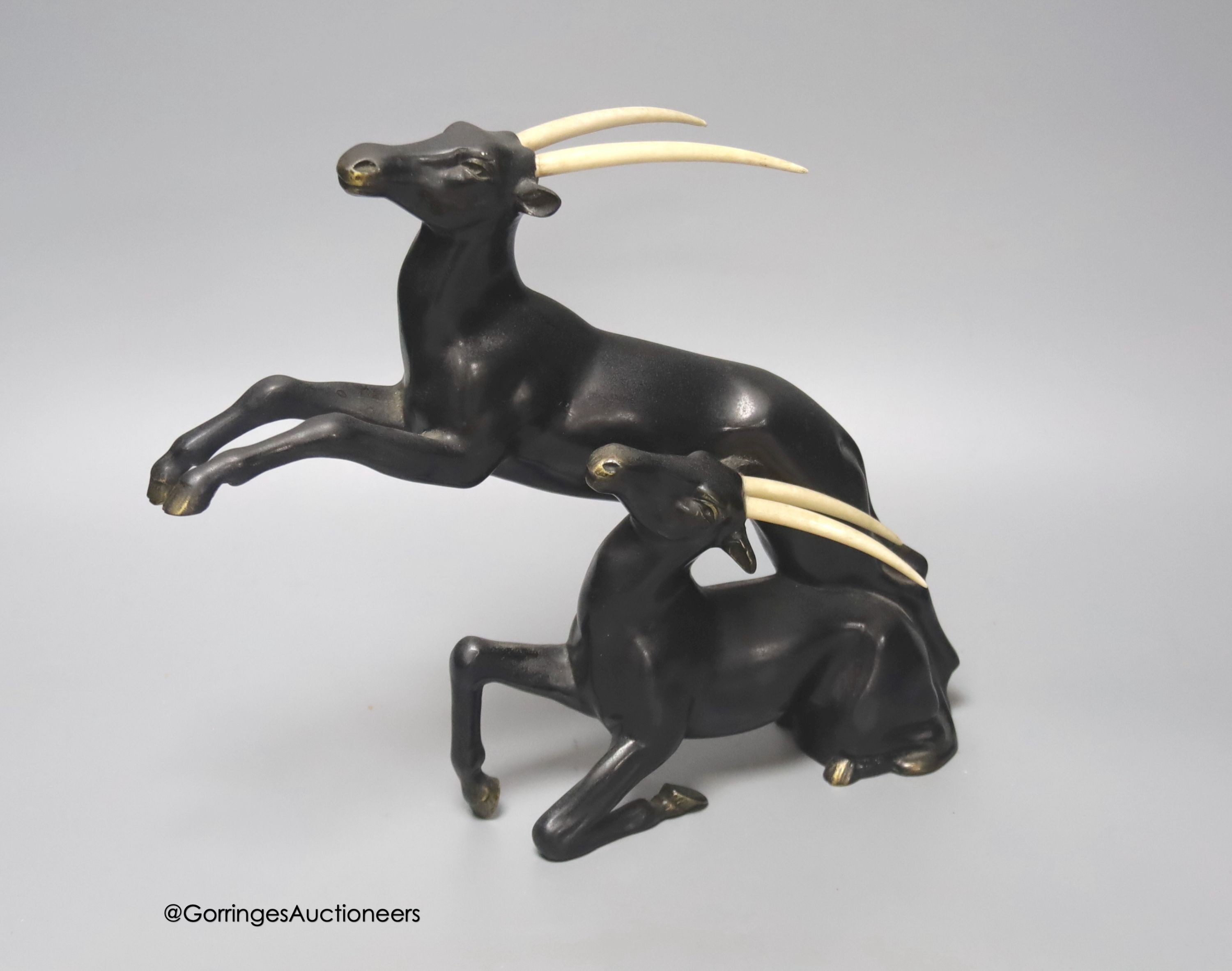 A painted bronzed spelter and ivorine antelope, in the style of Raoh Schorr, height 24cm